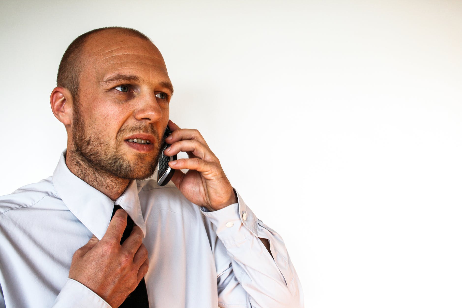 Man having a difficult call about financial marketing